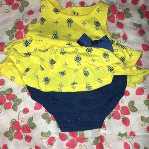 Onsie, yellow dress with blue flower design and blue bow